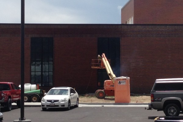 SHS cleaning off brick SHS cleaning off brick
