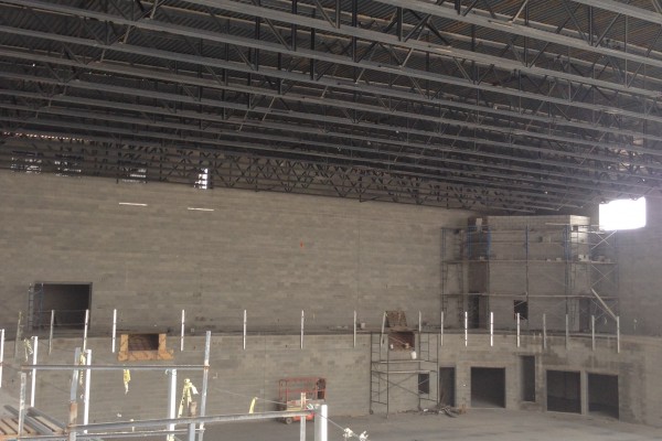 SHS main gym from track, doors to storage areas center right SHS main gym from track, doors to storage areas center right