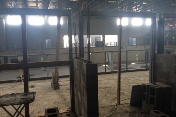 door frames being installed in main gym door frames being installed in main gym